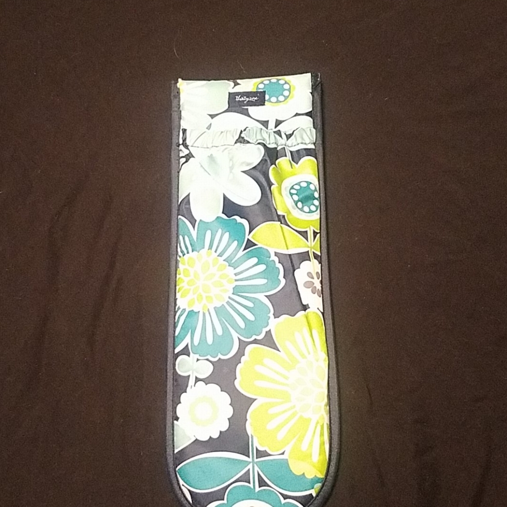Thirty-one curling iron holder.
